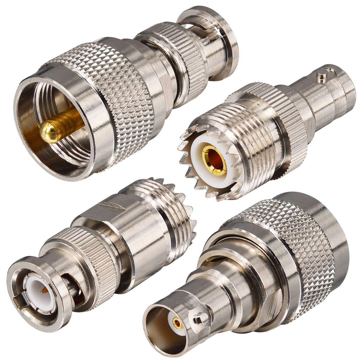 Grouped close-up of four silver-tone BNC-to-UHF coaxial adapters