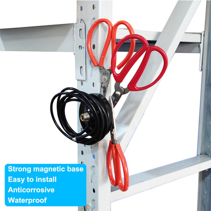 Black magnetic antenna base and coaxial cable arranged on an outdoor metal support frame