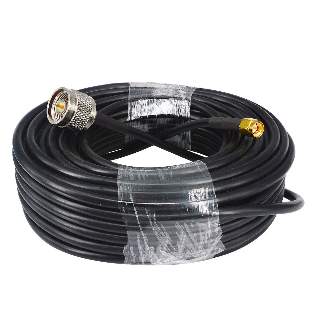 Taped coil of black RG58 cable with silver-tone N-male and gold-tone SMA male connectors